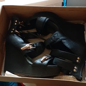 Black leather wedges